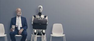man sitting with robot illustrating Virtual law office support